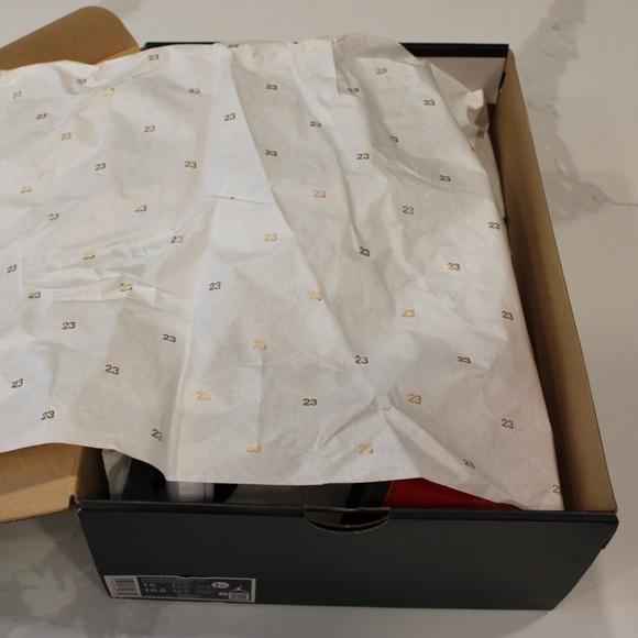 Jordan Nu Retro 1 G in Black, White, and University Red - Picture 7 of 8